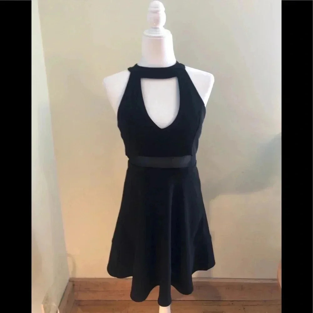Black mini dress with gold back zip